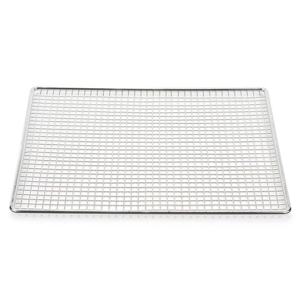 A metal tray with a grid.