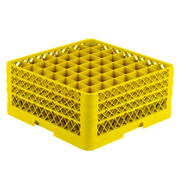 A yellow plastic Vollrath Traex glass rack with 49 compartments for holding small items.