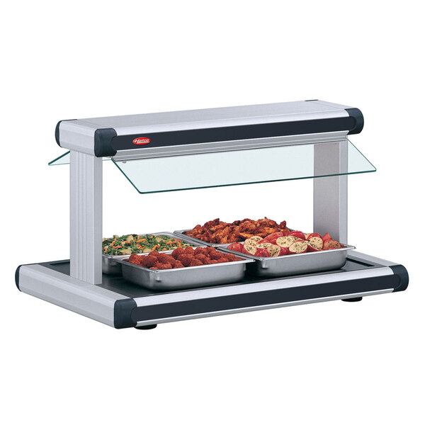 A Hatco buffet food warmer with food in it on a counter.