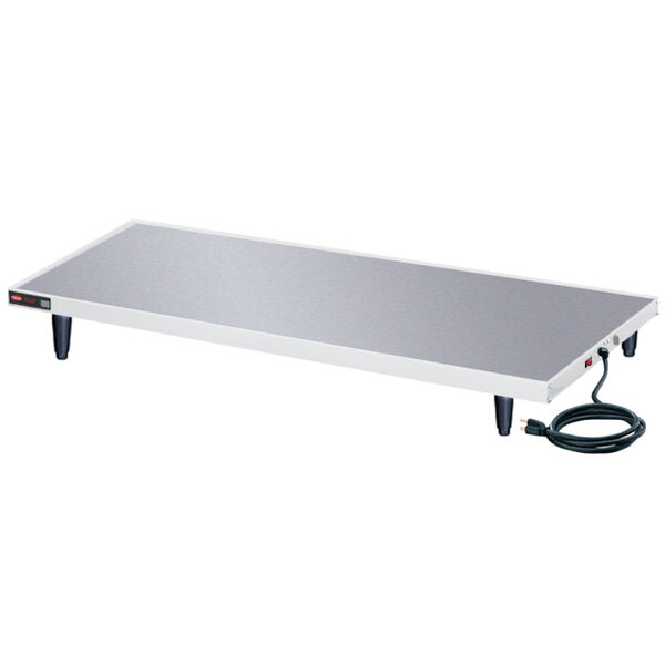 A white rectangular Hatco heated shelf with a power cord.