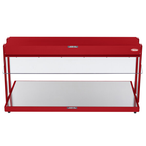 A red metal Hatco buffet warmer with glass shelves.