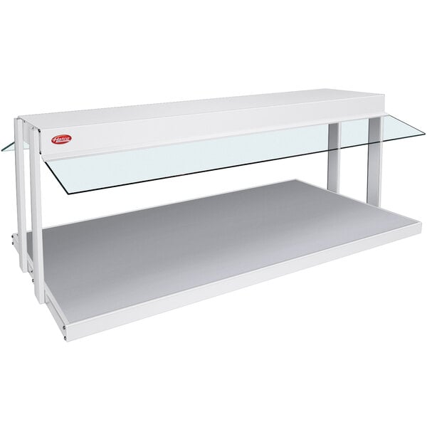 A white Hatco countertop buffet warmer with glass shelves.