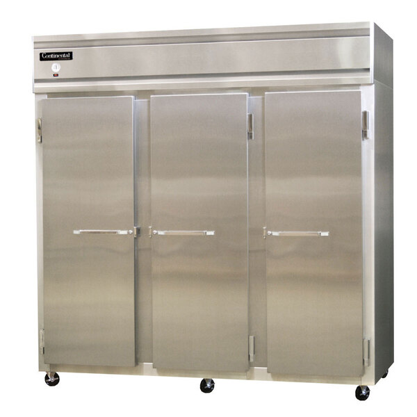 A large stainless steel Continental Refrigerator with three solid half doors.