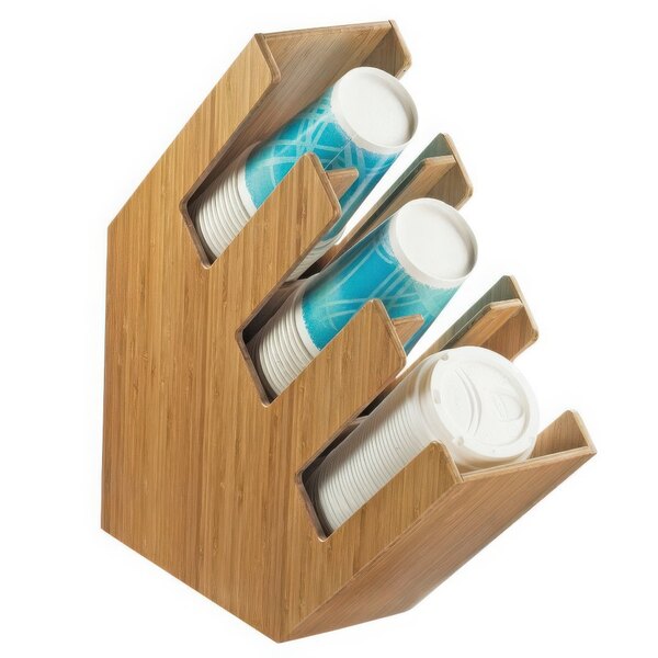 A Cal-Mil bamboo countertop cup and lid organizer with three sections holding white plastic cups.
