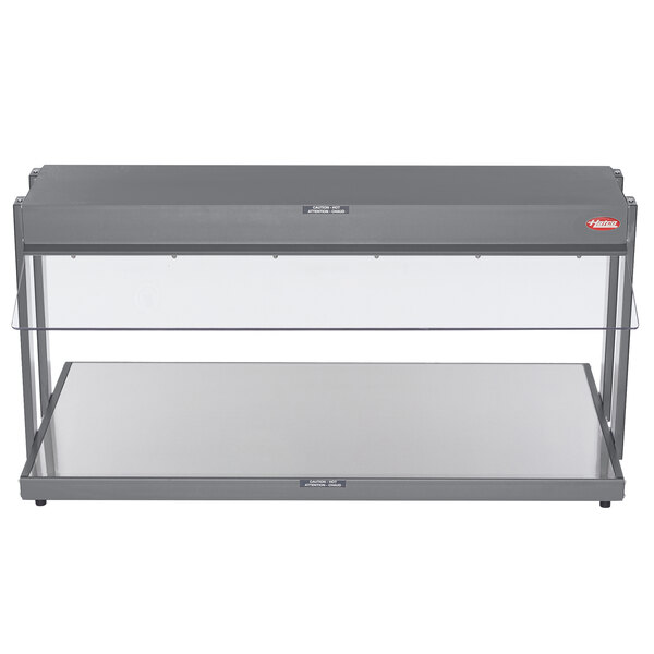 A grey rectangular Hatco buffet warmer with glass shelves.