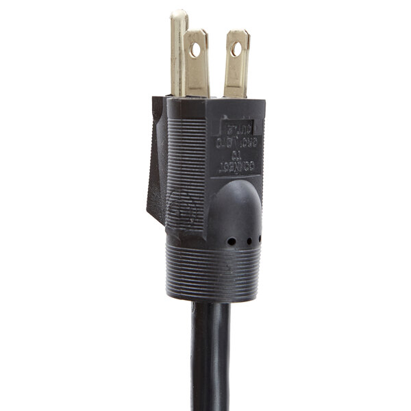 The black power cord with two plugs on the end of a Hatco buffet warmer.
