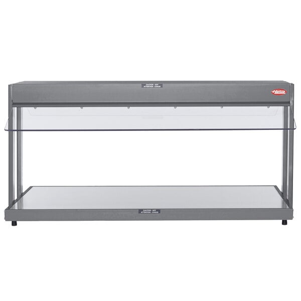 A gray Hatco countertop buffet warmer with glass shelves.