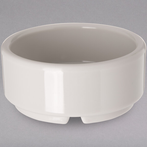 A white Carlisle straight sided ramekin.