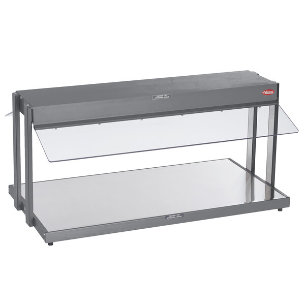 A grey metal Hatco countertop buffet warmer with glass shelves.