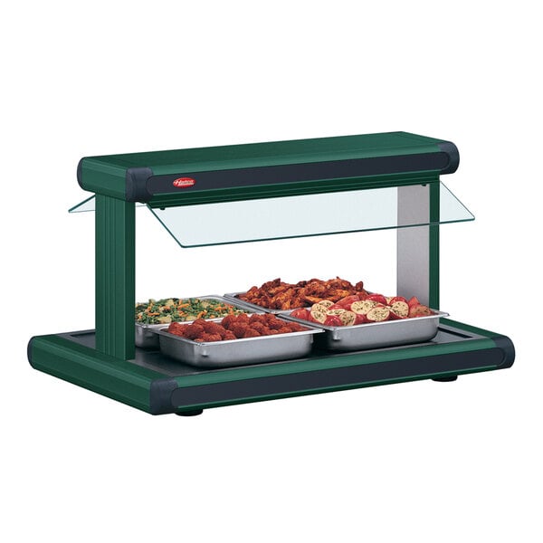 A Hatco Hunter Green buffet food warmer with food on it.