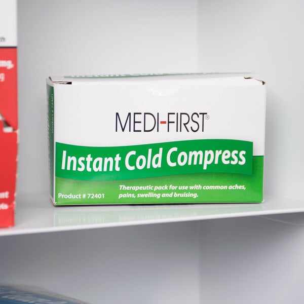 A white box with green text for a Medique instant cold compress.