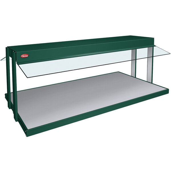 A green Hatco countertop buffet warmer with a glass top.