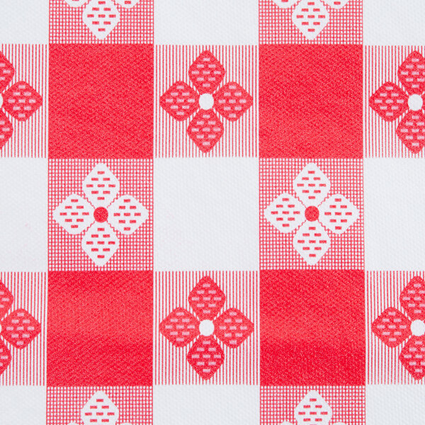 A red and white checkered Intedge vinyl table cover.