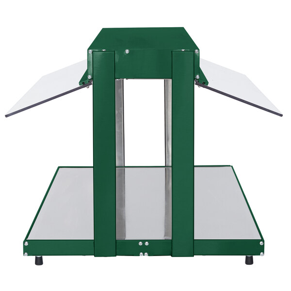 A white rectangular metal Hatco countertop buffet warmer with green trim and two shelves.