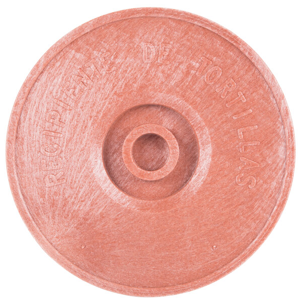 A pink polyethylene tortilla server disc with a hole in the center.