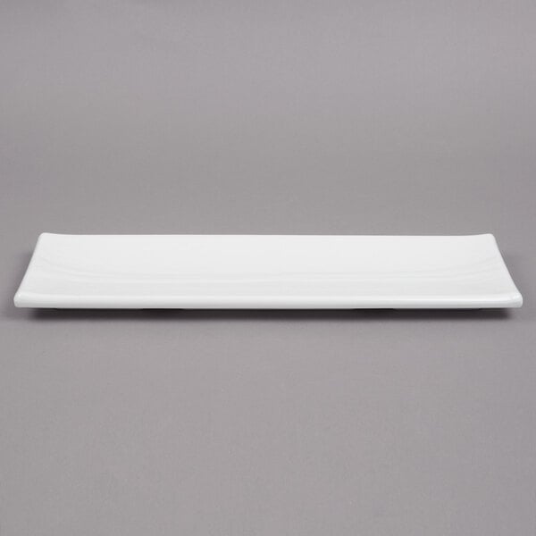 A white rectangular Tablecraft melamine tray with a black border.
