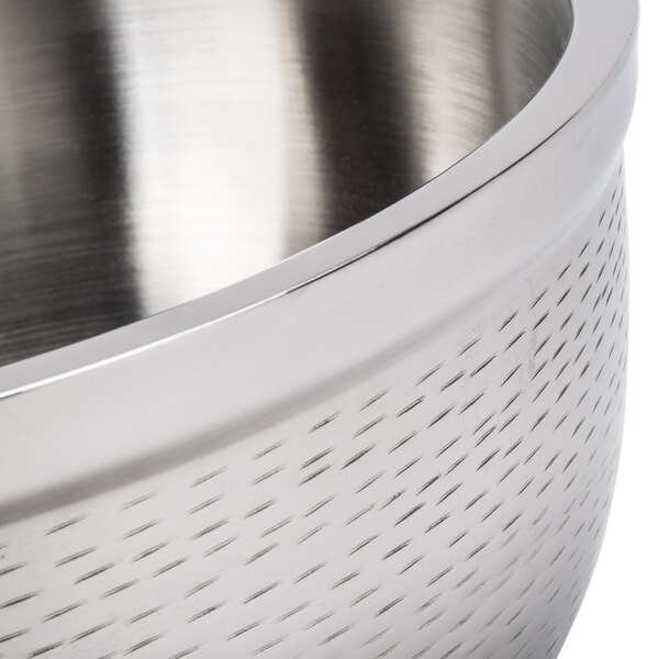 A Tablecraft Remington stainless steel bowl with a handle.