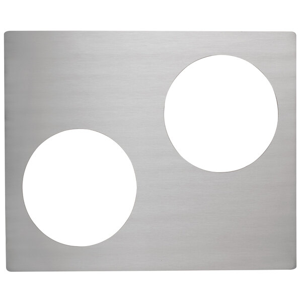 a silver plate with white circles