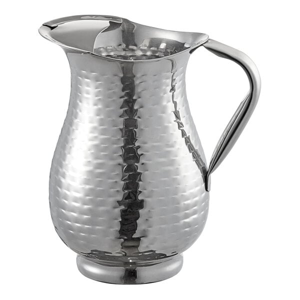 A Tablecraft stainless steel pitcher with a handle.