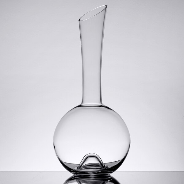 A clear glass decanter with a thin curved neck.