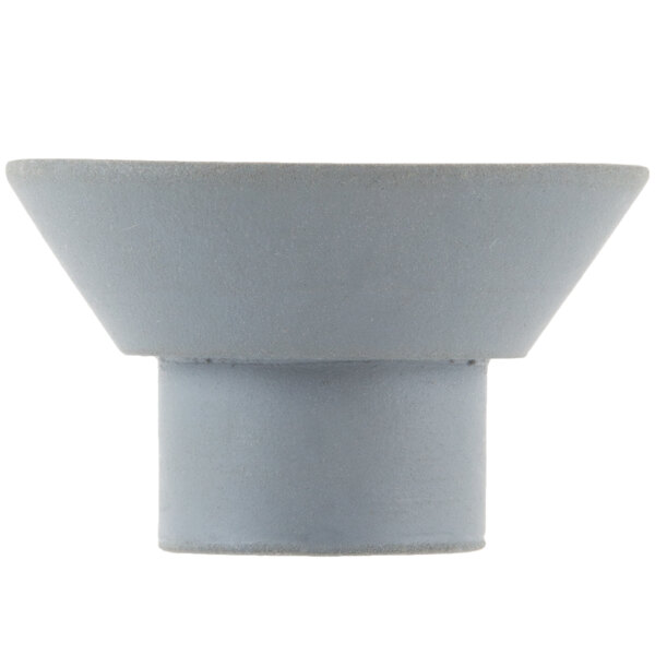 A grey cone shaped rubber suction foot.