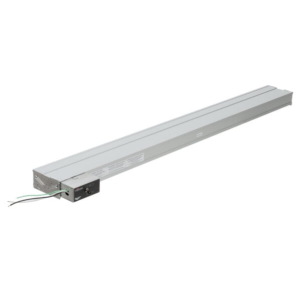 A long rectangular white metal strip with wires.