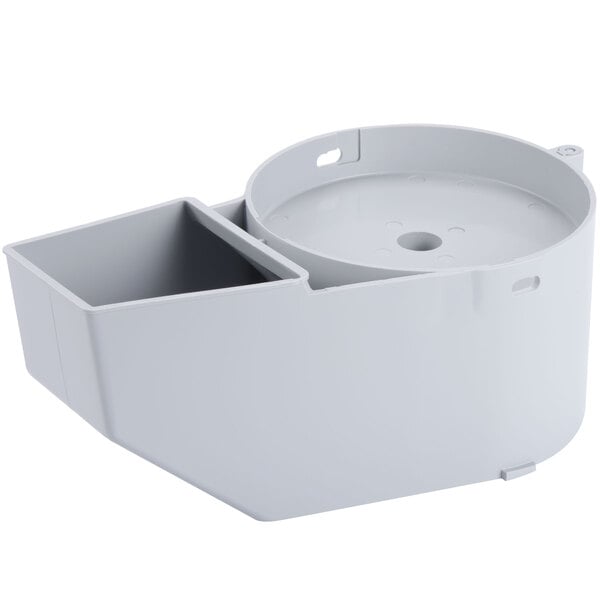 A white plastic container with a white circular lid with holes.