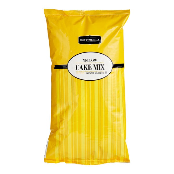 A yellow package of 5 lb. yellow cake mix.