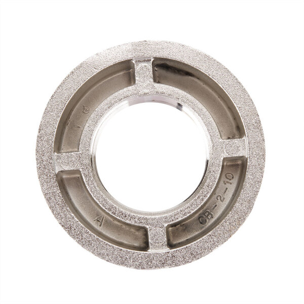 A close-up of a Waring blender locknut, a circular metal ring with a hole in the middle.