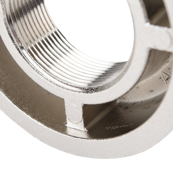A stainless steel threaded locknut for a Waring blender.