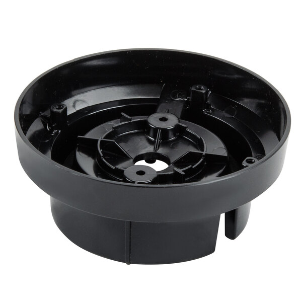 A black circular blender jar adapter with a circular hole.