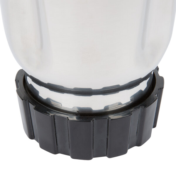 A stainless steel Hamilton Beach blender container base.