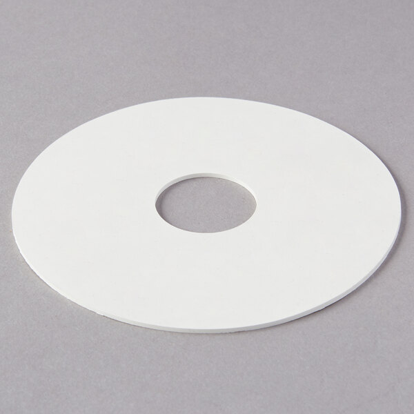 A white circular gasket with a hole in the center.