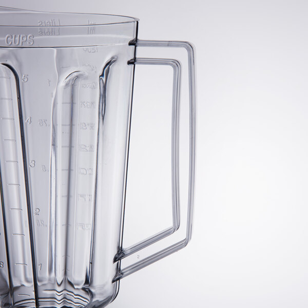 A clear plastic container with handles for a Hamilton Beach blender.