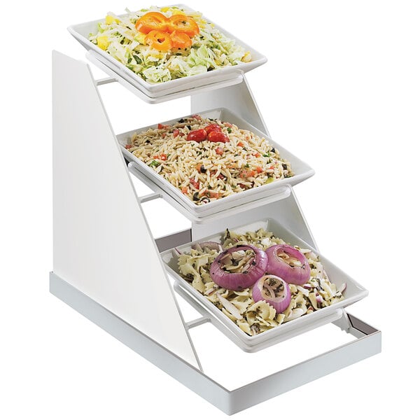 A Cal-Mil stainless steel display stand with three bowls of salad, tomatoes, and rice.