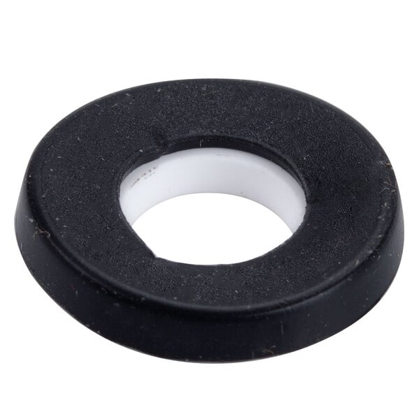 A black circle with a white circle inside it.