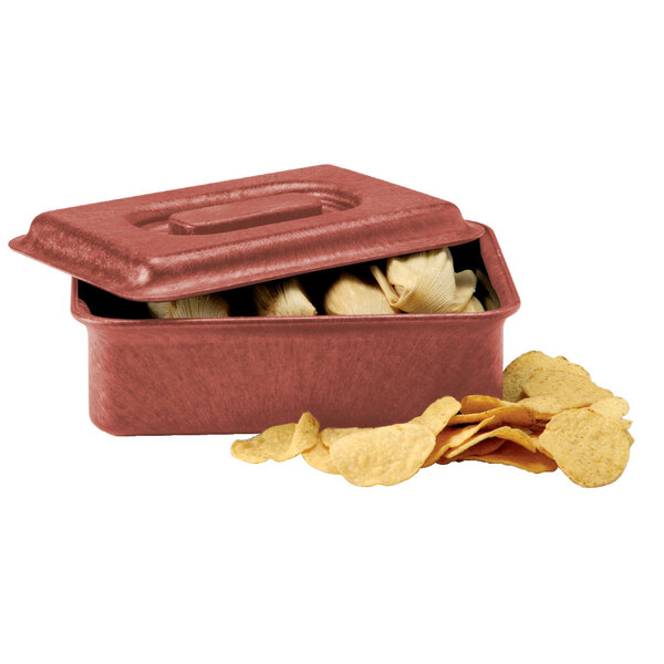 A red HS Inc. Paprika tamale server with food in it.