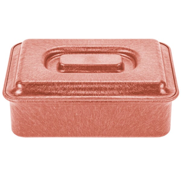 A copper-colored metal HS Inc. tamale server with a lid.