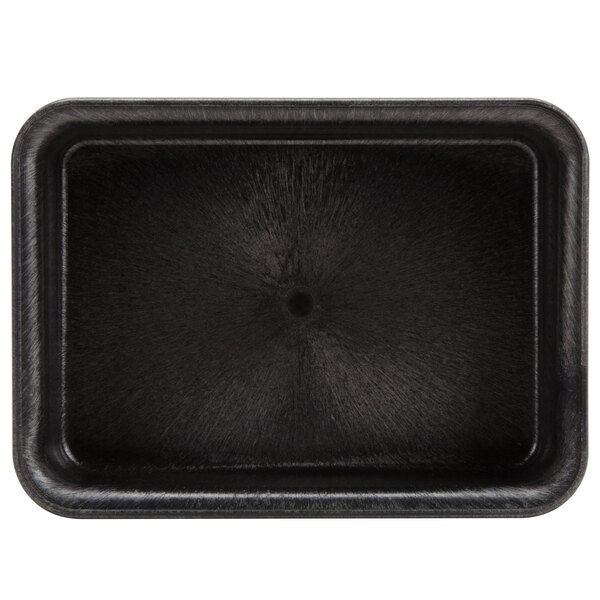 A black plastic rectangular tray with a black circle in the middle.