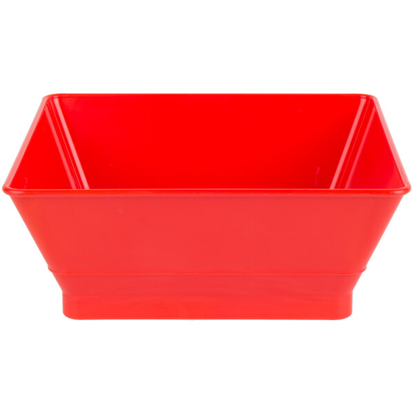 A red plastic square serving basket with a white background.