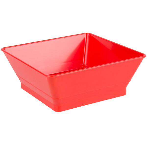 A red square bowl with a triangle shaped bottom.