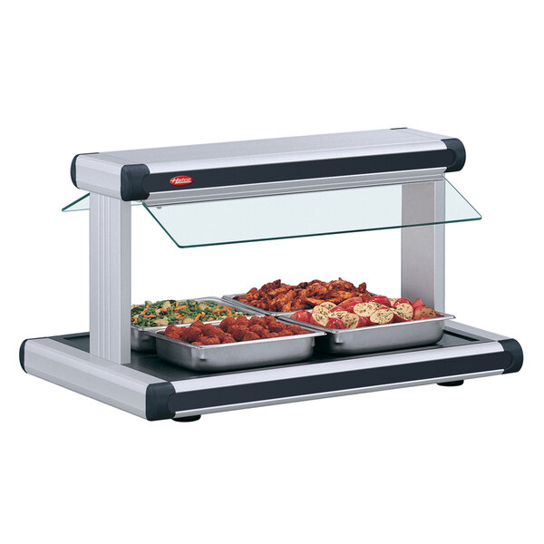 A Hatco buffet food warmer with food on it.