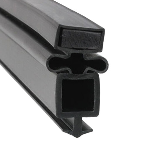 A close-up of a black rubber seal with a black square window and two holes.