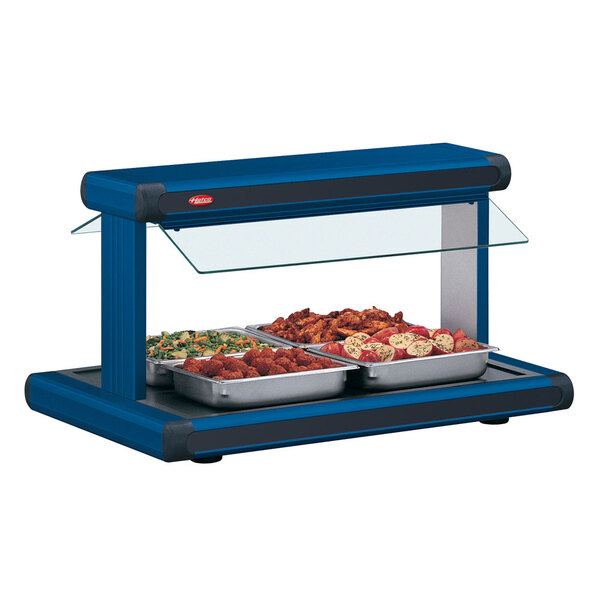 A navy blue Hatco buffet food warmer with food on it.