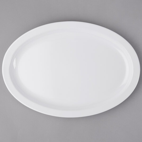 A white oval platter on a gray surface.
