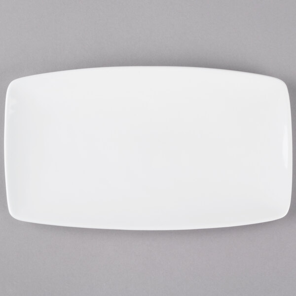 A white rectangular Tuxton china plate with tapered ends.