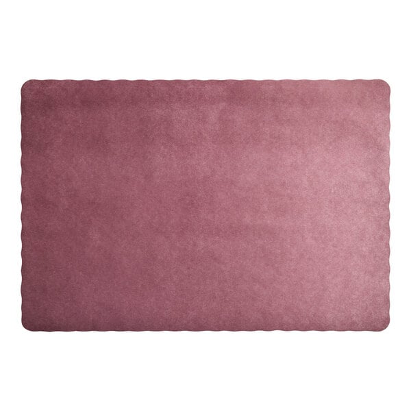 A gold-colored rectangular paper placemat with scalloped edges.