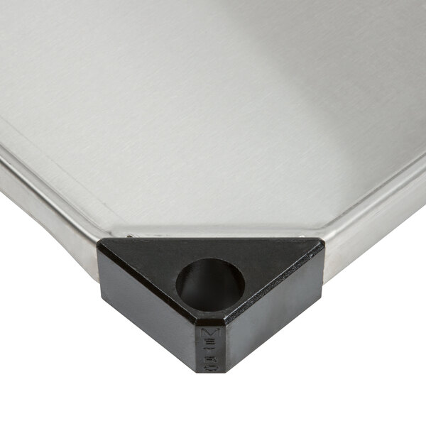 A Metro stainless steel flat shelf.