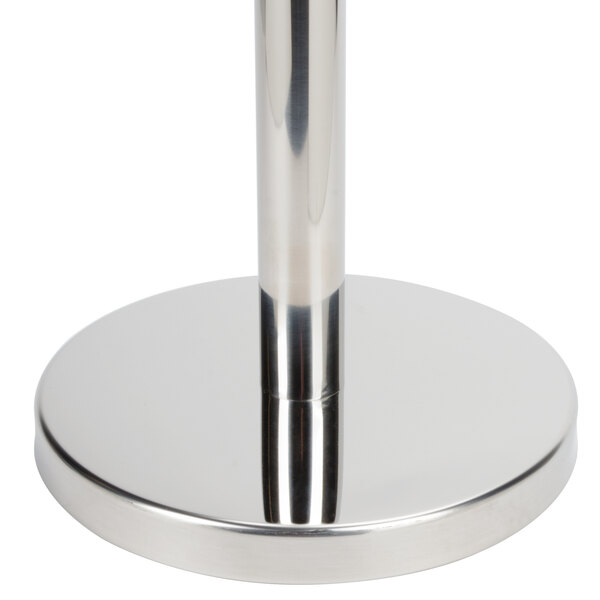 A chrome Aarco rope style crowd control stanchion with a round metal base.