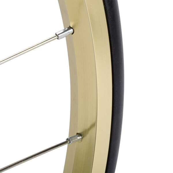 A close-up of a white Carnival King replacement wheel for a popcorn cart.